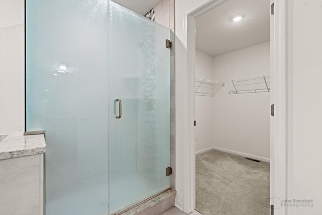 bathroom with walk in shower