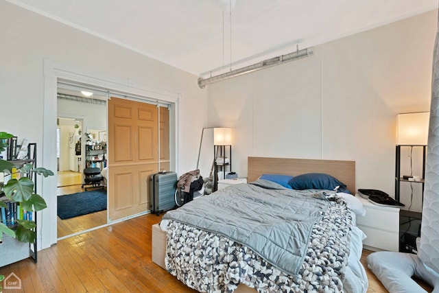 bedroom featuring hardwood / wood-style floors