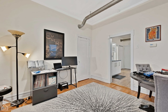 home office featuring hardwood / wood-style floors