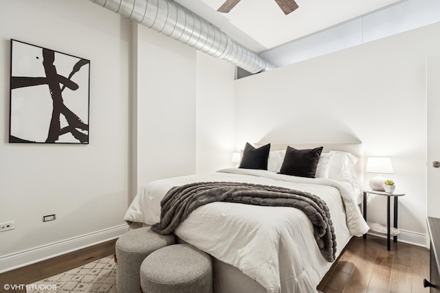 bedroom featuring dark hardwood / wood-style floors and ceiling fan