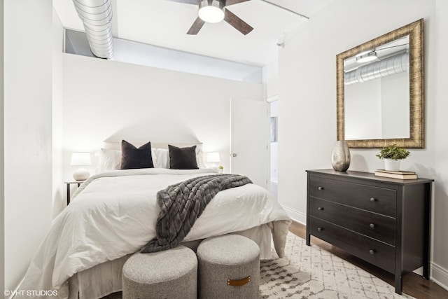 bedroom featuring light hardwood / wood-style floors and ceiling fan