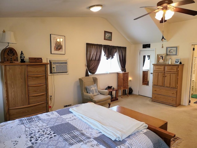 carpeted bedroom featuring a wall mounted air conditioner and vaulted ceiling