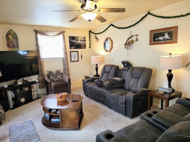 living room with light colored carpet and ceiling fan