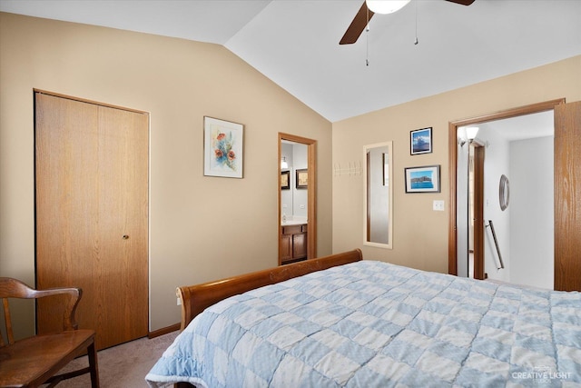 carpeted bedroom with vaulted ceiling, a ceiling fan, and a closet