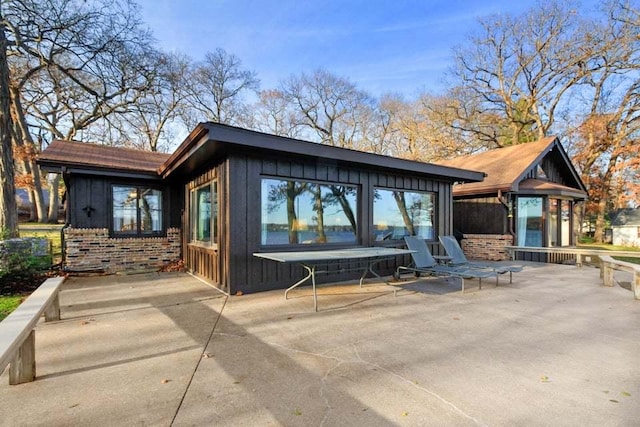 rear view of property with a patio area