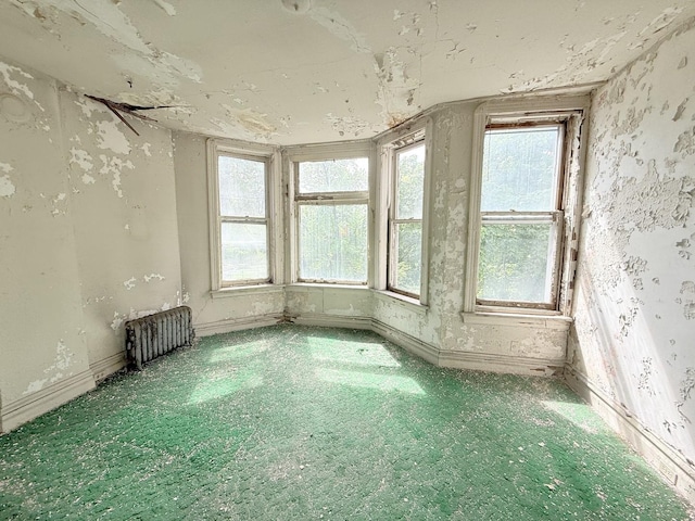 7243 S Perry Ave, Chicago, IL 60621 - empty room featuring radiator and carpet