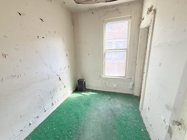 7243 S Perry Ave, Chicago, IL 60621 - empty room featuring carpet flooring, healthy amount of natural light, and radiator heating unit