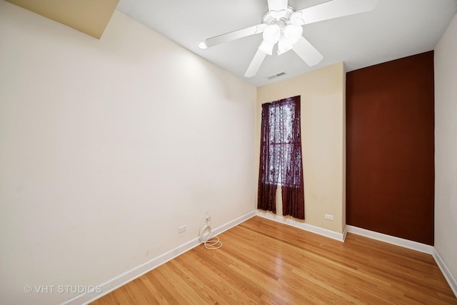 6742 S Clyde Ave Unit 1S, Chicago, IL 60649 - unfurnished room with light wood-style flooring and a ceiling fan