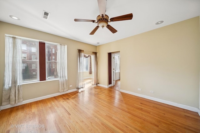 empty room with a ceiling fan, visible vents, baseboards, recessed lighting, and light wood-style floors