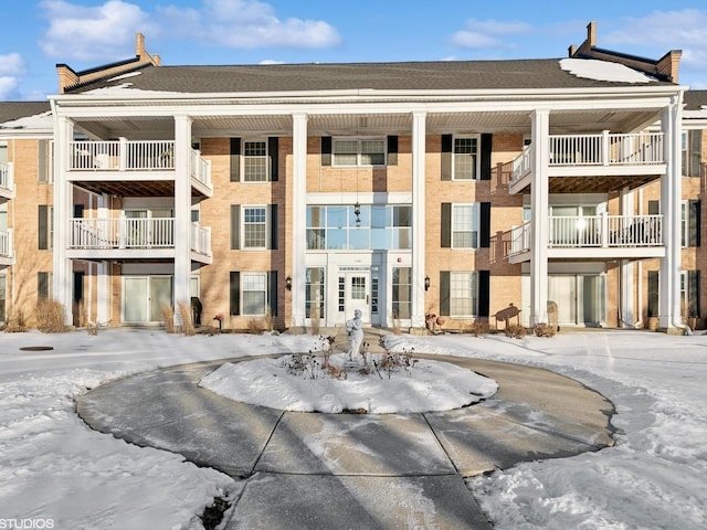 view of snow covered property