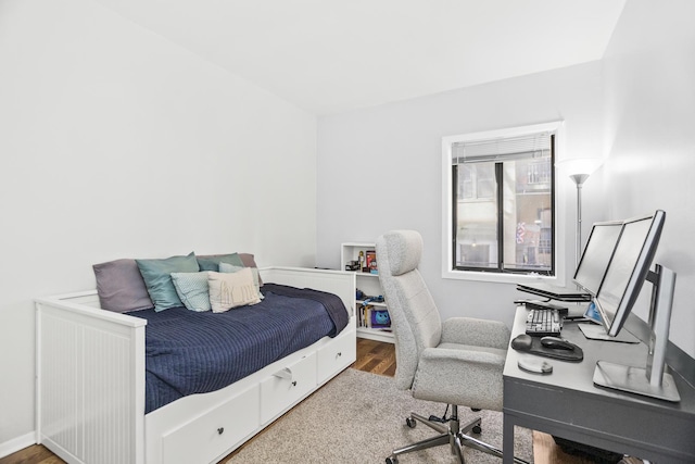 bedroom featuring hardwood / wood-style floors