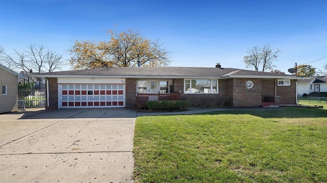 single story home with a garage and a front yard