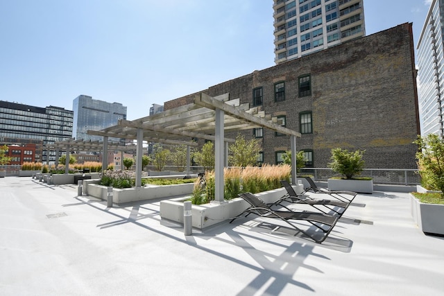 surrounding community featuring a pergola and a patio area