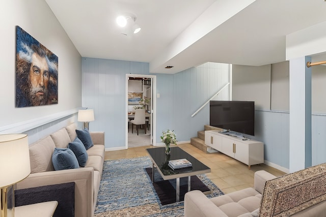 living room with light tile patterned floors