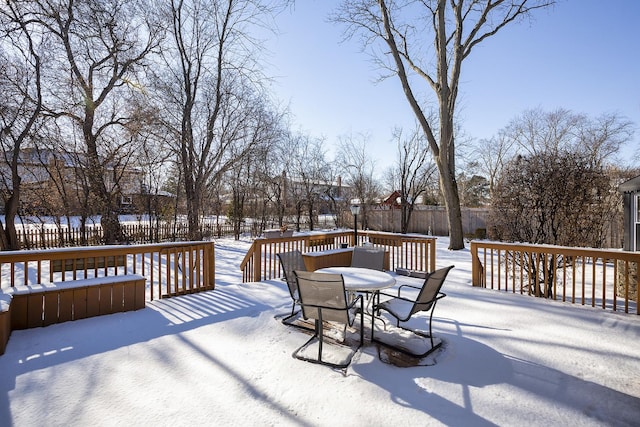 view of snow covered deck