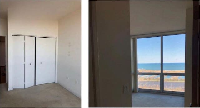 unfurnished bedroom featuring a closet and a water view