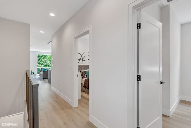 hallway featuring light hardwood / wood-style flooring