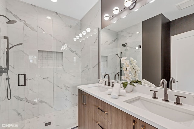 bathroom featuring vanity and walk in shower