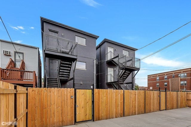 view of front of property with a balcony