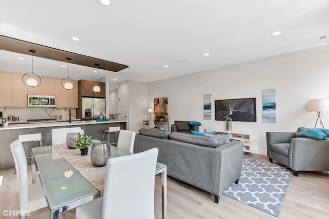 dining room featuring light wood-type flooring