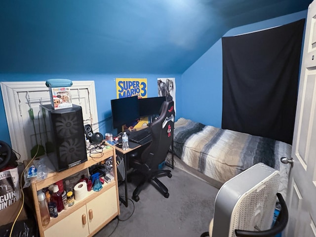 bedroom featuring lofted ceiling