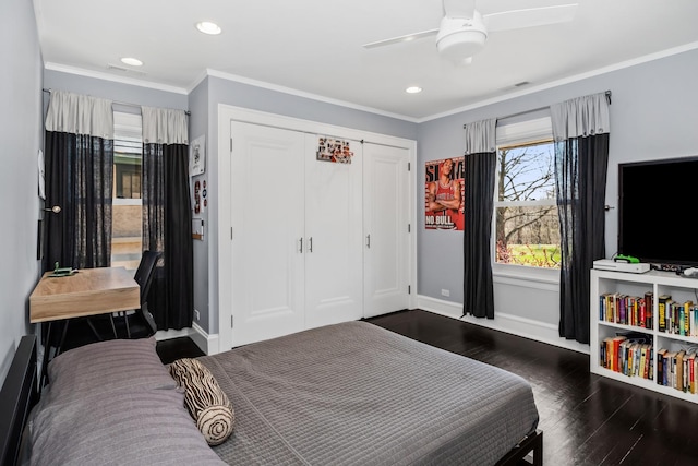 1319 Lincoln St, Evanston, IL 60201 - bedroom featuring a closet, ceiling fan, baseboards, ornamental molding, and dark wood-style floors