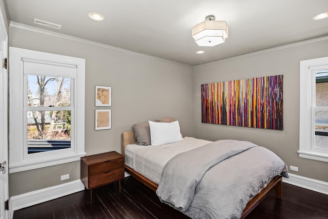 1319 Lincoln St, Evanston, IL 60201 - bedroom with wood-type flooring, visible vents, crown molding, and baseboards