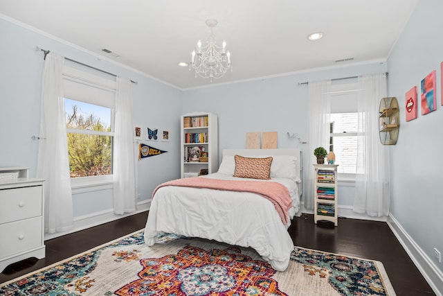 1319 Lincoln St, Evanston, IL 60201 - bedroom featuring an inviting chandelier, multiple windows, and visible vents