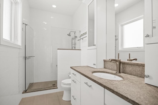 1319 Lincoln St, Evanston, IL 60201 - full bathroom with tile patterned flooring, vanity, toilet, and tiled shower