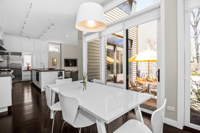 1319 Lincoln St, Evanston, IL 60201 - dining area with dark wood finished floors and track lighting