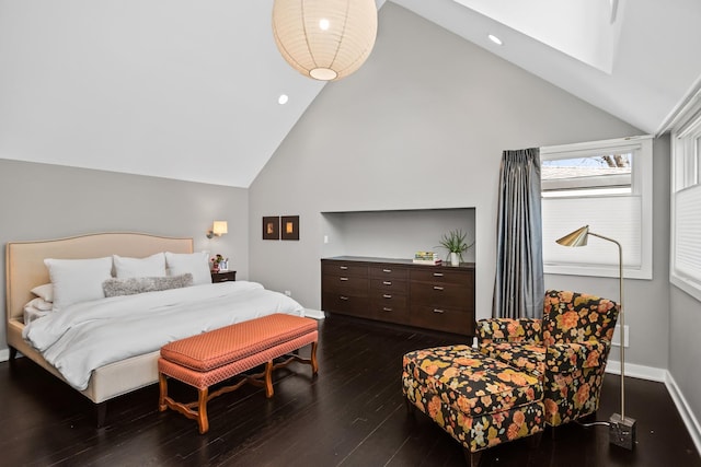 1319 Lincoln St, Evanston, IL 60201 - bedroom featuring a skylight, baseboards, high vaulted ceiling, and dark wood-style flooring