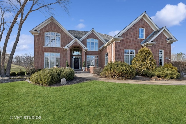 front facade with a front lawn