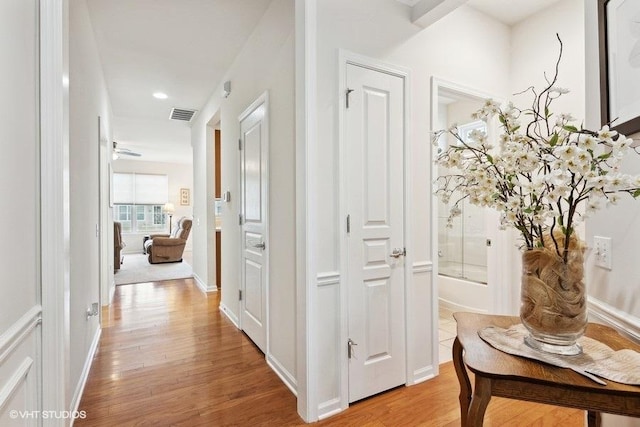 hallway featuring light hardwood / wood-style floors