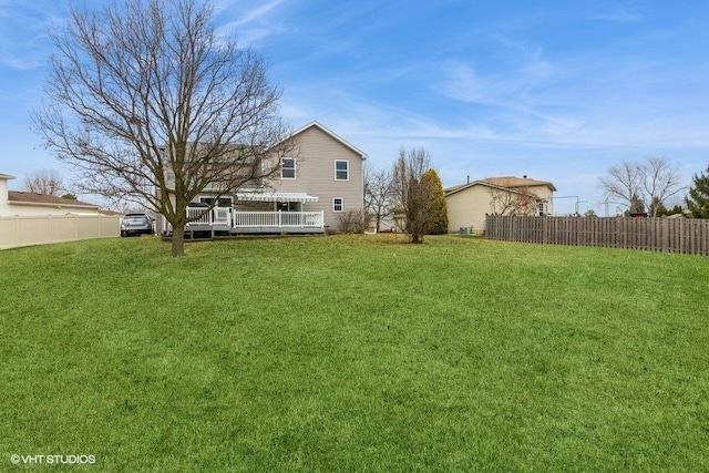 view of yard with a deck