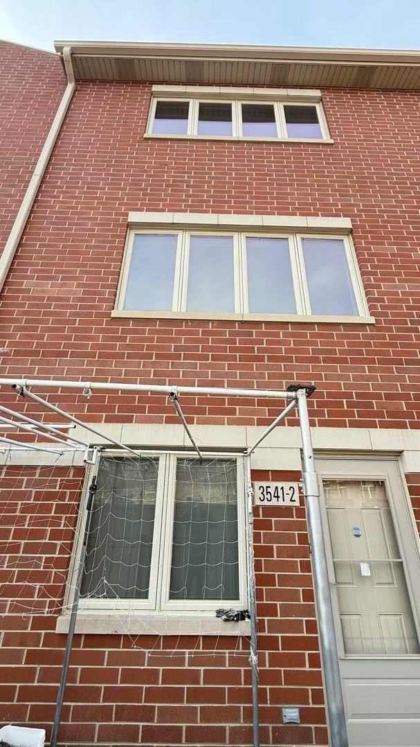 3541 S Maplewood Ave Unit 2, Chicago, IL 60632 - exterior space with brick siding