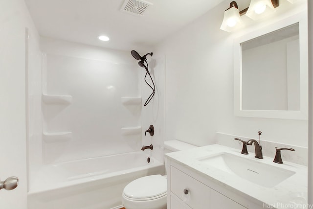 full bathroom featuring vanity, toilet, and bathing tub / shower combination