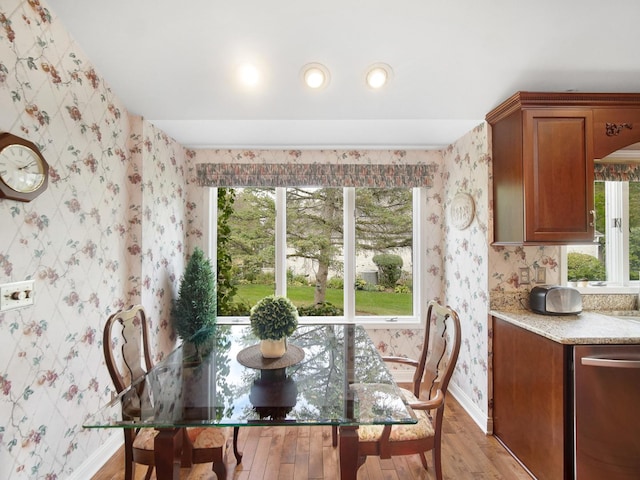 unfurnished dining area with hardwood / wood-style floors