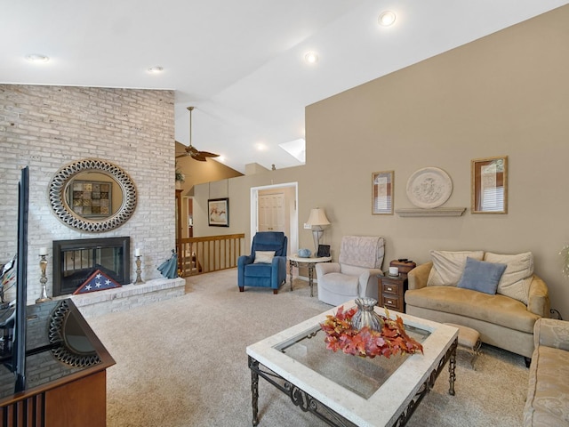 living room featuring a fireplace, vaulted ceiling, ceiling fan, and carpet