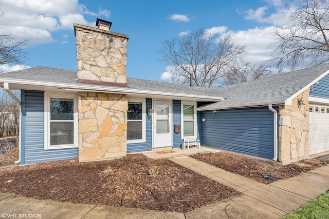 view of front of home with a garage