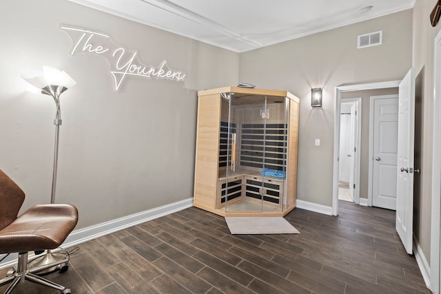 wine area with dark hardwood / wood-style floors