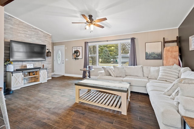 living room featuring ornamental molding, lofted ceiling, dark hardwood / wood-style floors, and ceiling fan