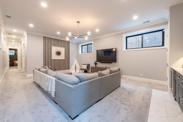 carpeted living room with an inviting chandelier and crown molding