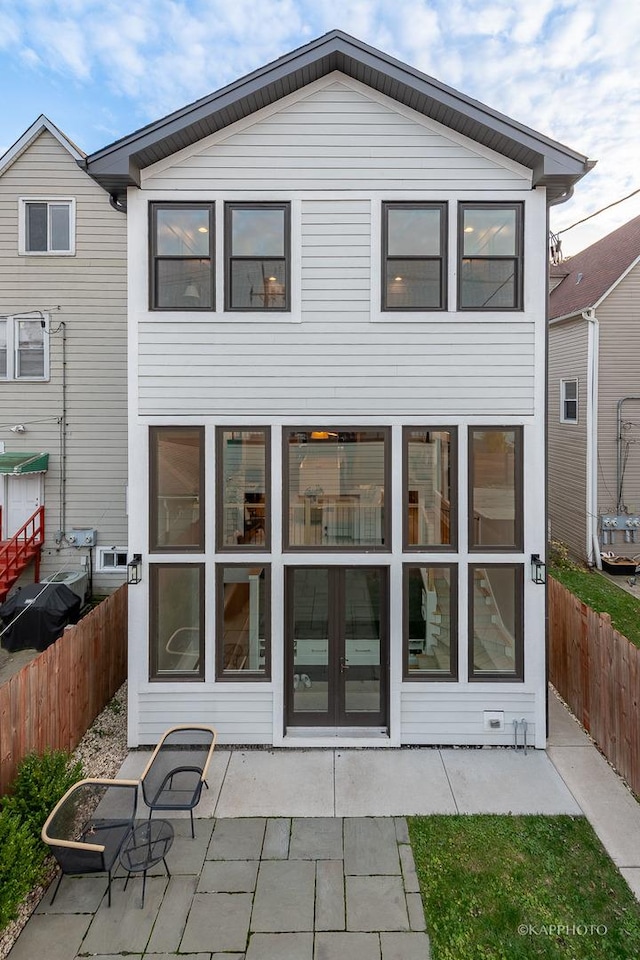 rear view of property with a patio area