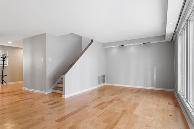 unfurnished room featuring light hardwood / wood-style floors