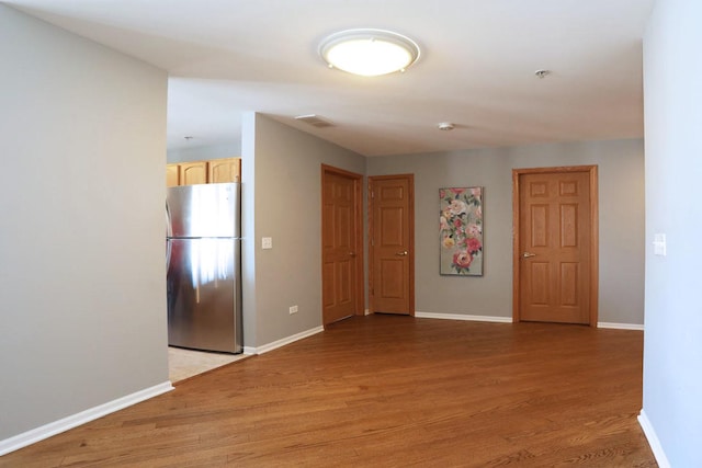 empty room featuring light hardwood / wood-style flooring