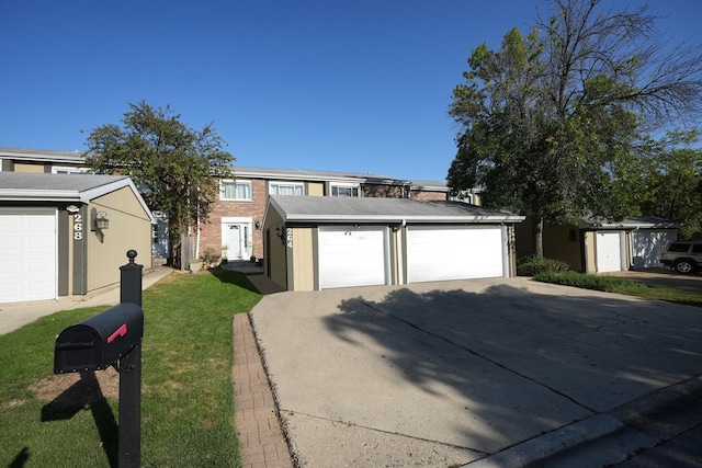 view of front of home featuring a garage and an outdoor structure