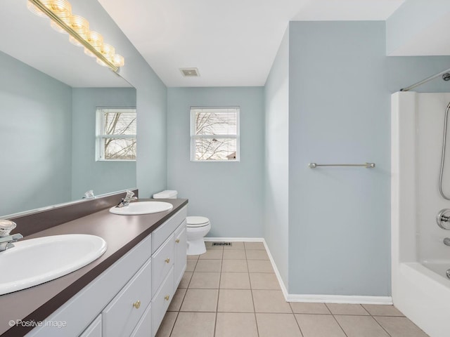 full bathroom featuring bathtub / shower combination, tile patterned floors, toilet, and vanity