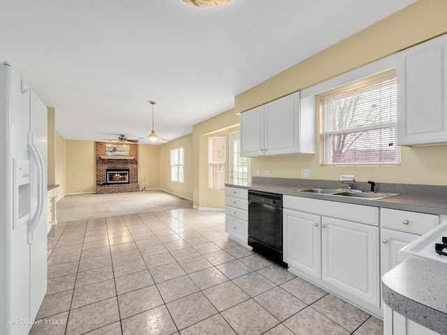 kitchen with white cabinetry, black dishwasher, sink, hanging light fixtures, and white fridge with ice dispenser