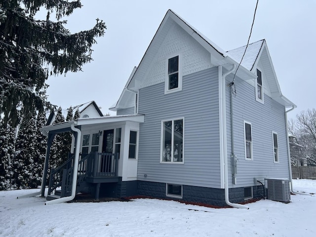 view of front of home with central air condition unit