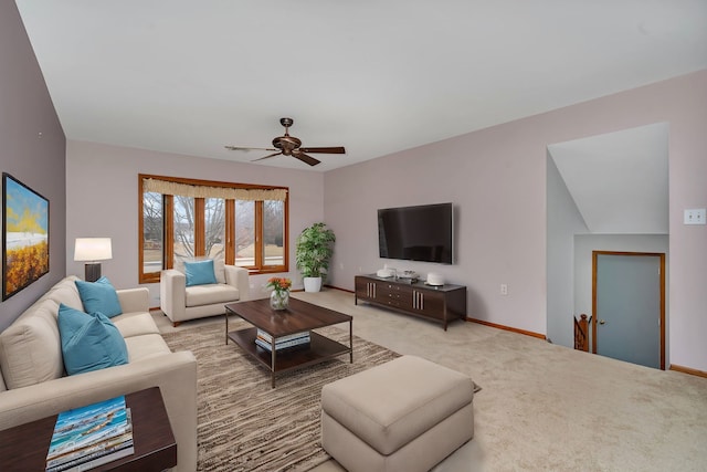 living room featuring light colored carpet and ceiling fan